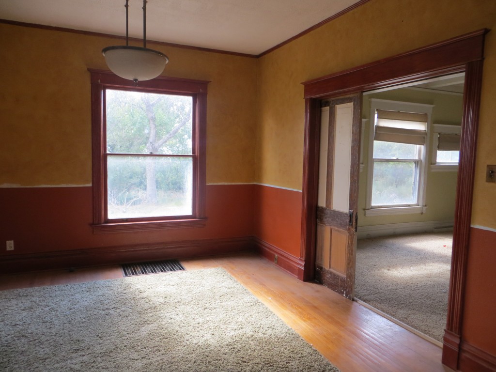 Front "music room" before.  View towards dining room