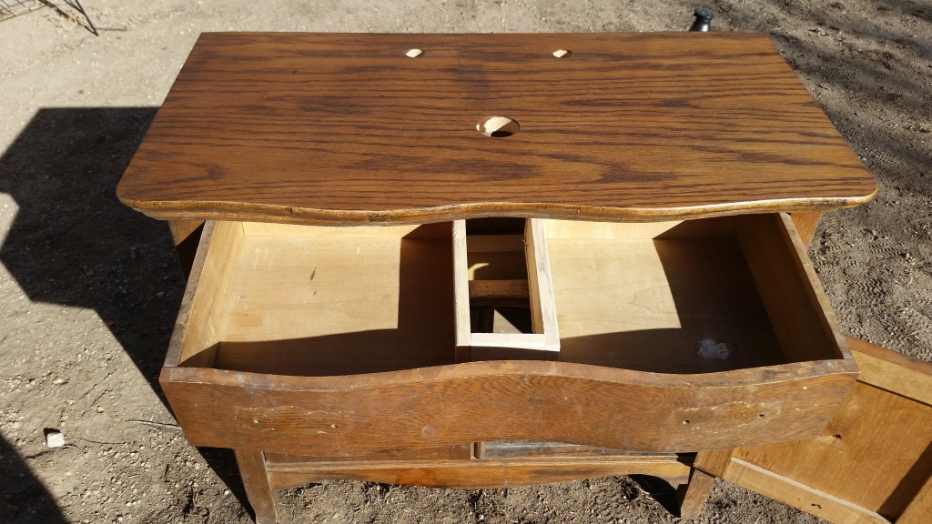 Holes drilled and drawer retro-fitted to allow for plumbing